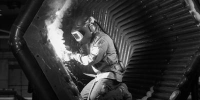 Why is a review of the Workplace Exposure Standards for welding fume needed?